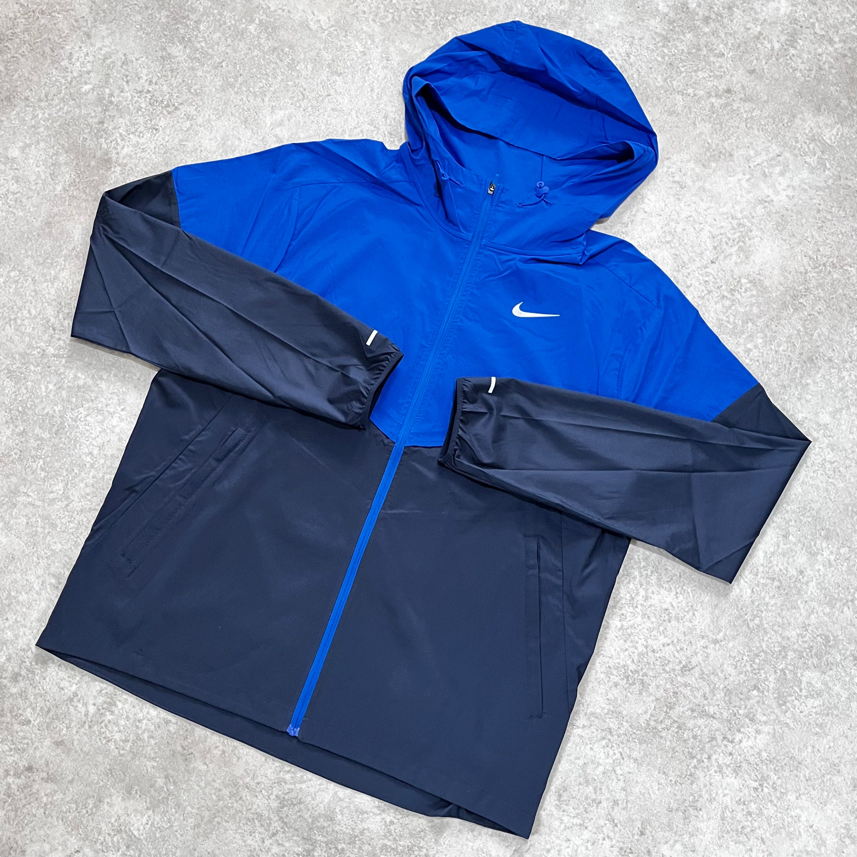 Royal blue shop windbreaker nike